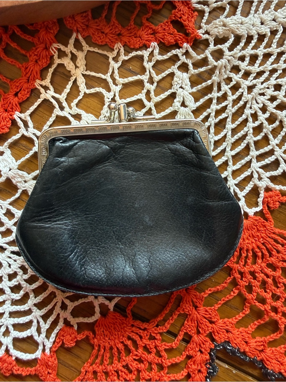 Vintage mid-century black leather coin purse with kiss-lock frame